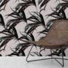 Feathr Winter Palm wallpaper in green colour lifestyle image with a chair in the foreground|Feathr Winter Palm wallpaper in green colour lifestyle image with a chair in the foreground