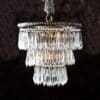 Curious Egg Sophia chandelier dark lifestyle image.|Curious Egg Sophia chandelier light lifestyle image.|Curious Egg Sophia chandelier closeup image from top.|Curious Egg Sophia chandelier closeup image from side.